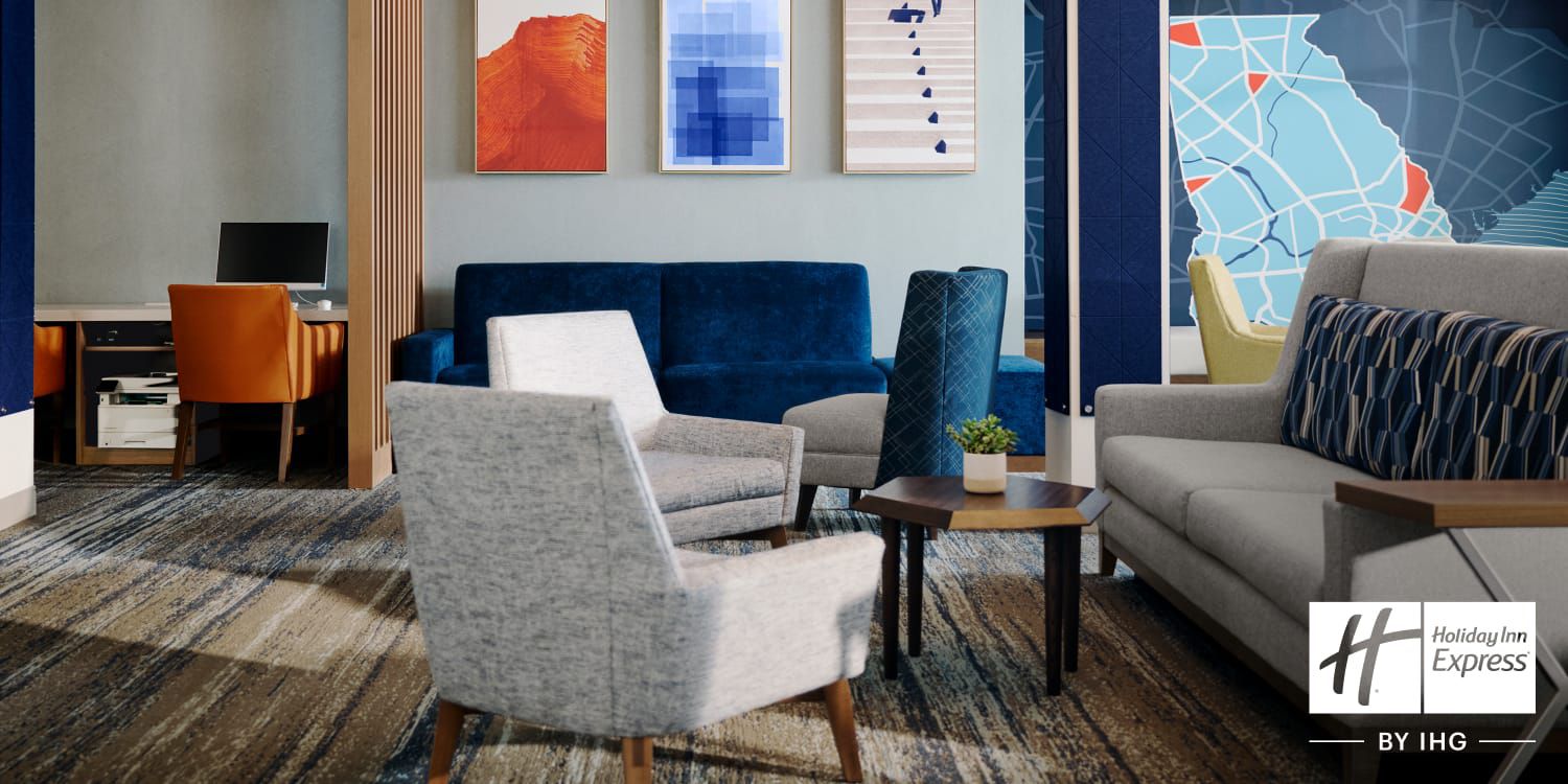 A modern seating area with blue and orange accents.